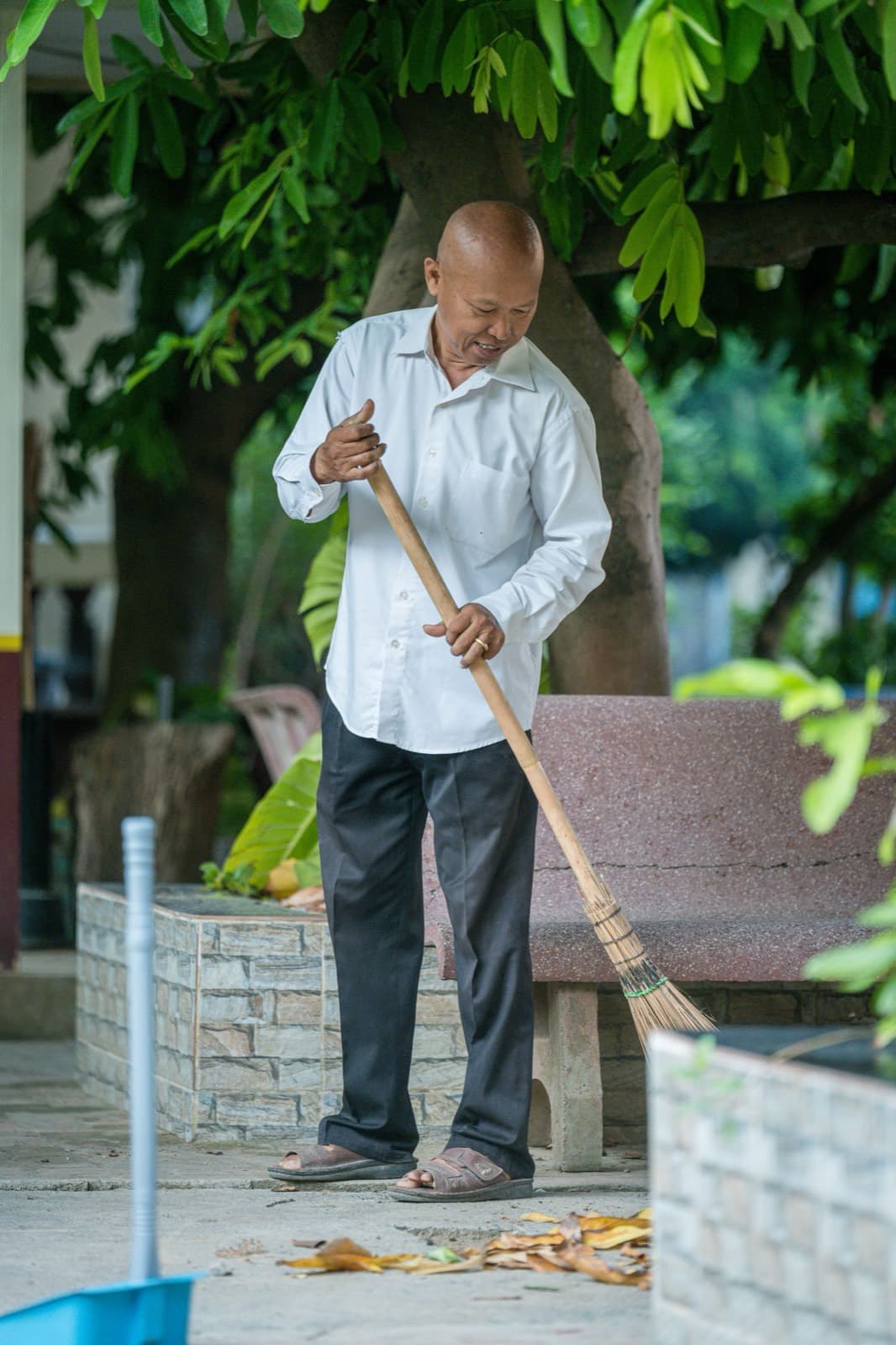 Light household work outdoors — sweeping and keeping the home tidy